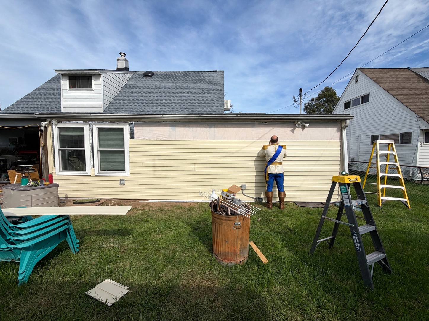 Prince Charming installing siding on Snow White's house