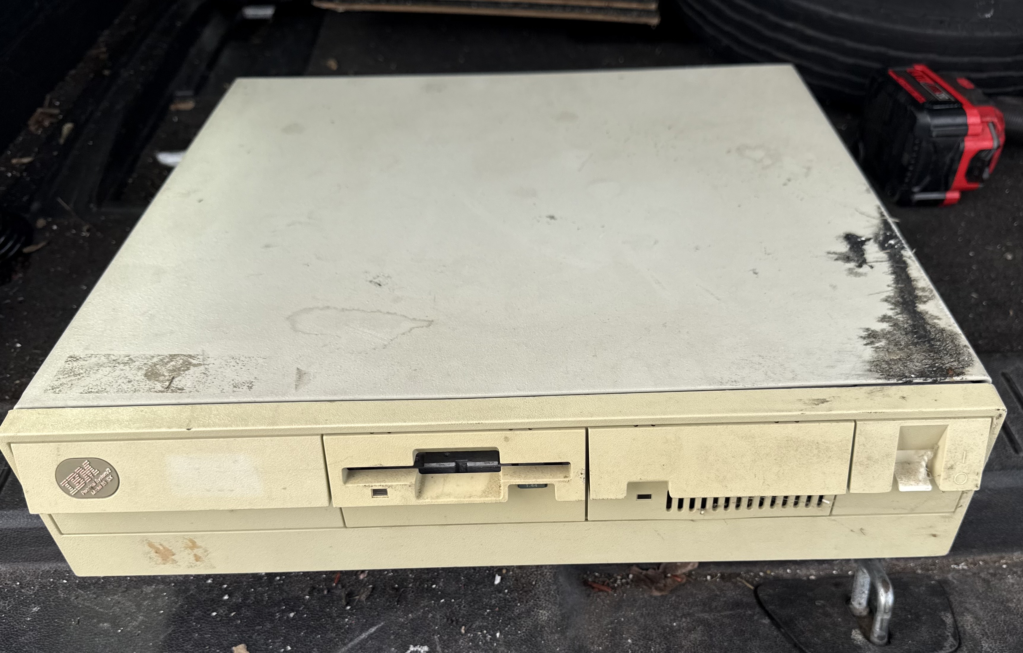 The weathered beige desktop computer announced as AwfulWorld’s new server